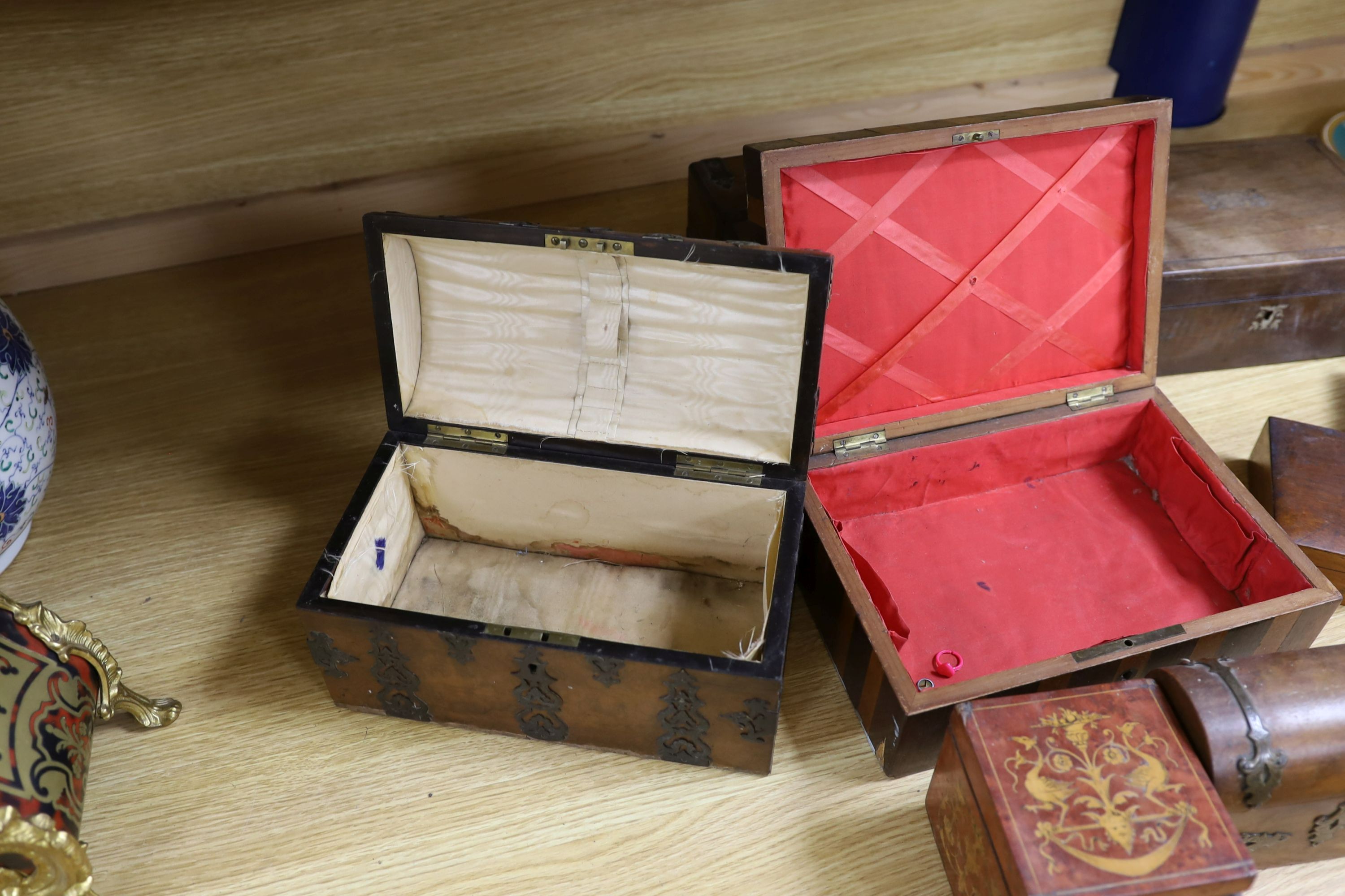 A Victorian Walnut and brass strap mounted tea caddy together with two caskets and five other boxes (8)